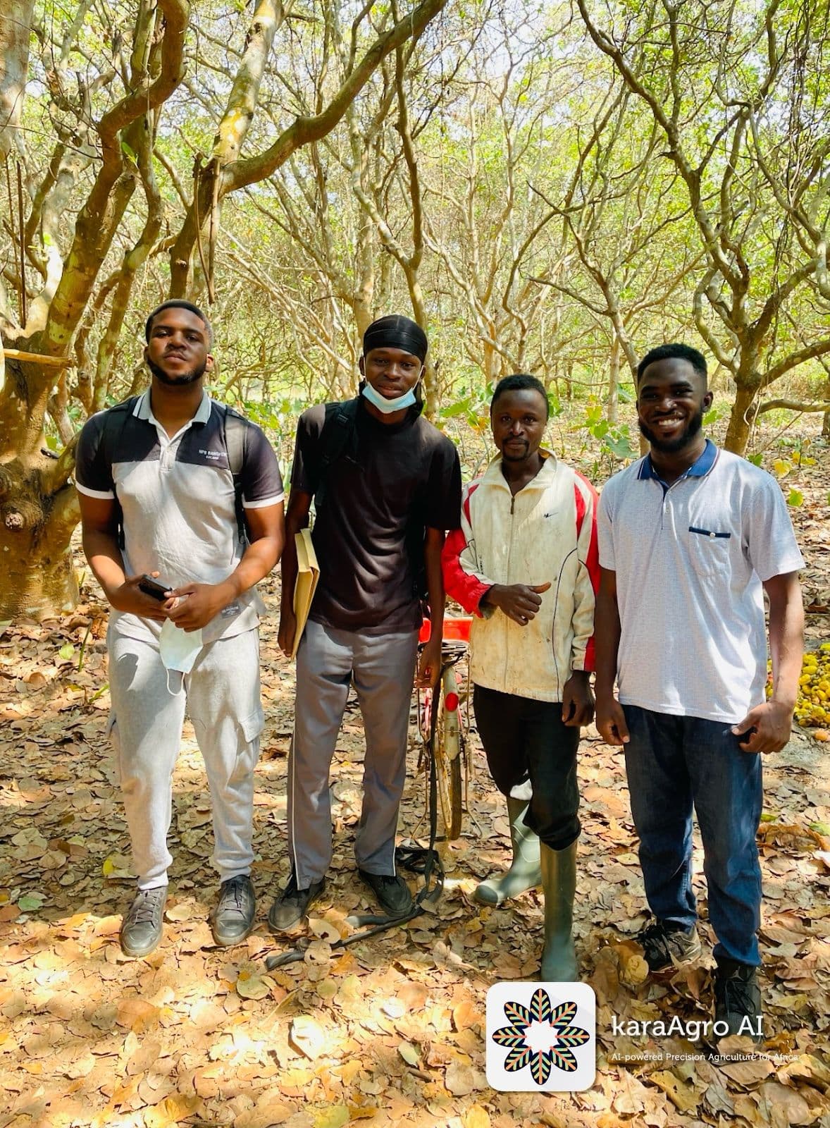 Team and a local farmer during field operations
